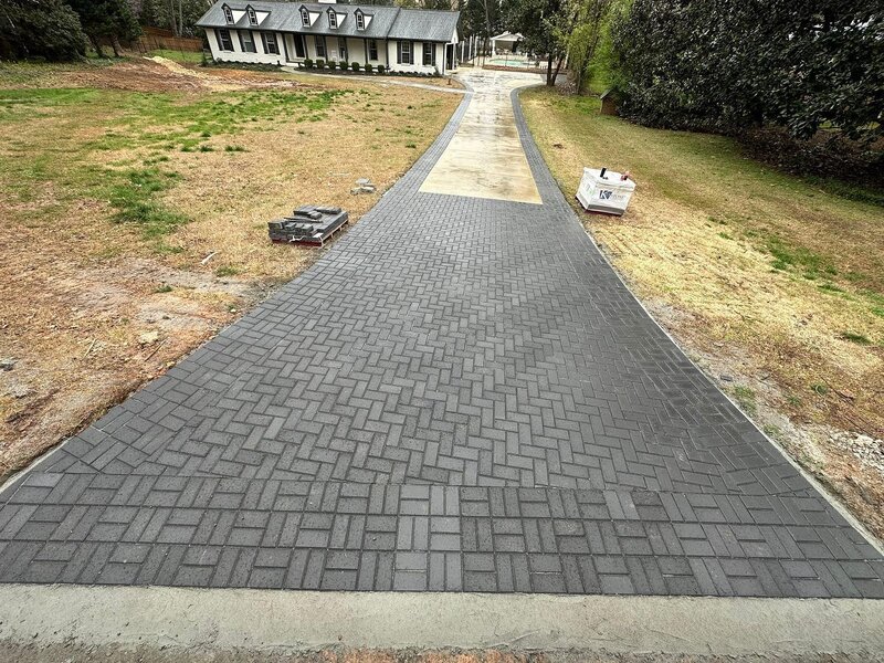 Driveway apron and border with pavers.