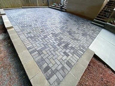 Permeable pavers, Retainning walls and concrete driveway apron.